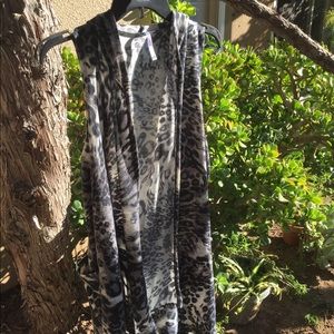 Animal print vest with pockets and hood